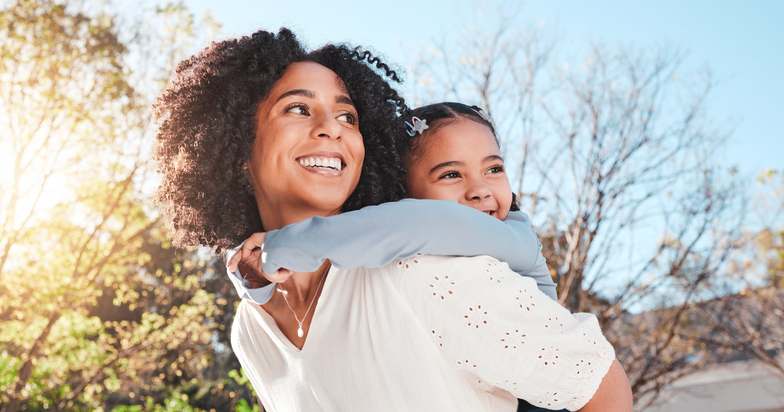 Mother, child and family outdoor with love and care for piggyback to a play game for fun in backyard. Smile of woman and girl kid in nature to relax together in summer with a hug for support or trust.